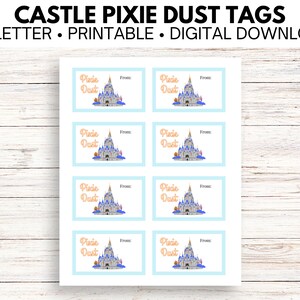 May include: Eight printable gift tags featuring a blue and white castle with a peach colored roof and the text "Pixie Dust" in orange. The tags are on a light blue background with the word "From" in black text.