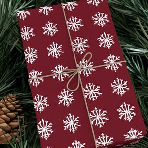 Snowflake Holiday Wrapping Paper Red Christmas Gift Wrap Elegant Winter Festive Paper Seasonal Pattern Stylish Celebration Burgundy Roll