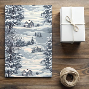 May include: A vintage wrapping paper design featuring a snowy winter scene with houses, trees, and winding paths. The paper is blue and white with a subtle pattern.