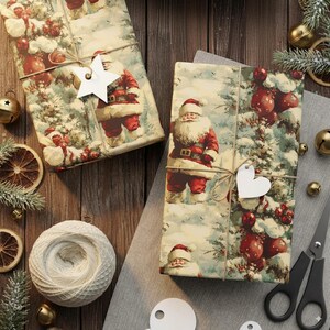 May include: Two wrapped Christmas gifts with Santa Claus illustrations on the wrapping paper. The gifts are tied with twine and adorned with star and heart-shaped tags. The scene includes bells, greenery, and a spool of white twine.
