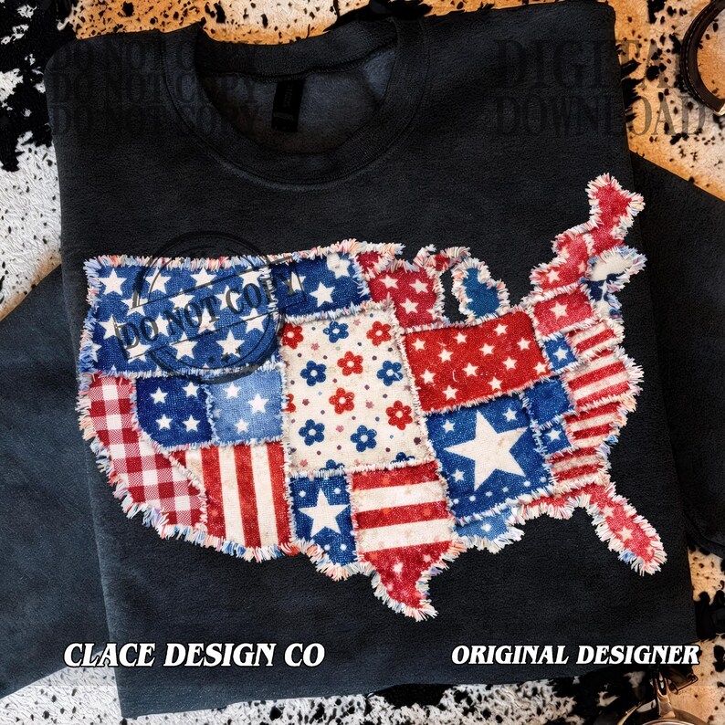 May include: Dark gray sweatshirt featuring a patchwork design of the United States map. The map is composed of red, white, and blue fabric patches with stars, stripes, and floral patterns. The text "DO NOT GO" is printed on the map.