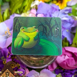 Cartão lenticular de sapo fofo, cartão de carteira com GIF animado, sapo engraçado e caprichoso comendo uma mosca