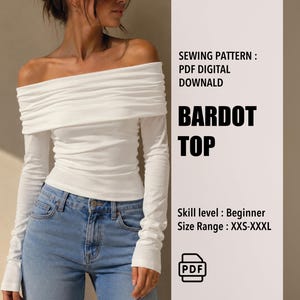 May include: A white long-sleeve off-the-shoulder top with a gathered neckline. The text reads: SEWING PATTERN: PDF DIGITAL DOWNALD BARDOT TOP Skill level: Beginner Size Range: XXS-XXXL. A PDF icon is included at the bottom of the text section.