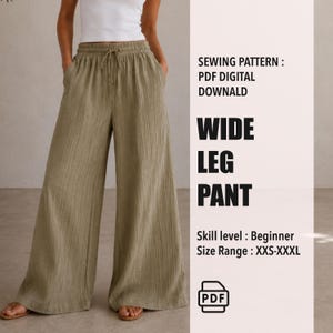 Può includere: Pantaloni ampi color verde oliva con vita con coulisse e tasche. Il modello di cucito digitale PDF è per principianti, disponibile nelle taglie XXS-XXXL. È presente anche il testo "WIDE LEG PANT".