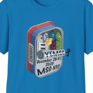 May include: Blue t-shirt featuring a sardine can graphic with cartoon fish playing instruments. The can reads "Sardines" and includes text for "YEMSC" and "December 28-31 2025 MSG NYC."