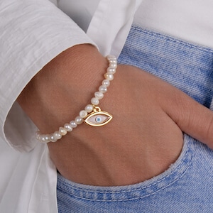 Handmade beaded bracelet. Real pearl bracelet with a dainty eye charm for women. The minimalist and delicate bracelet you will love! Dainty pearl bracelet comfortable and elegant, high-quality gift 💗