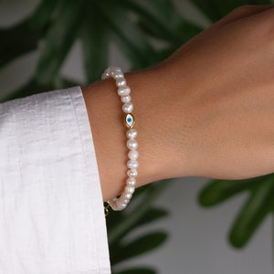 Handmade beaded bracelet. Real pearl bracelet with a dainty eye charm for women. The minimalist and delicate bracelet you will love! Dainty pearl bracelet comfortable and elegant, high-quality gift 💗
Perfect also for a bride or the bridesmaids ❤