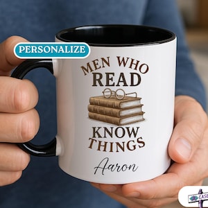 May include: White ceramic mug with a black rim and handle. The mug has a brown graphic of a stack of books with glasses on top and the text "Men who read know things" with a personalized name "Aaron".