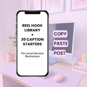 May include: A smartphone displays the text "REEL HOOK LIBRARY + 30 CAPTION STARTERS For Local Service Businesses." A computer monitor shows "COPY, PASTE, POST." The scene includes a pink mouse, keyboard, and desk accessories.
