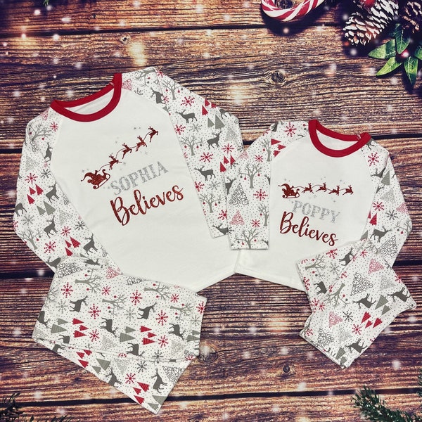 Personalised matching family Christmas pyjamas. Girls, boys, mum, dad and baby, believe,