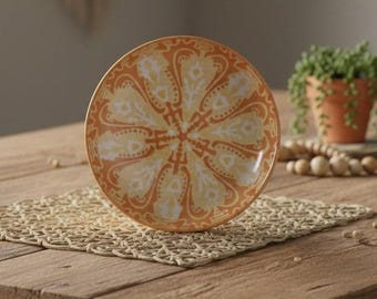 Plato de loza, Monte Clemens China, década de 1970, Tridente bajo vidriado, color naranja amarillento