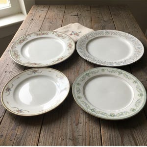 Platos llanos surtidos Noritake, cuatro piezas, porcelana multicolor vintage, vajilla de repuesto, decoración de pared.