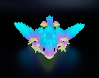 Glowing winged baby moon dragon, poseable 3d printed dragon in rainbow colors with hand-painted eyes
