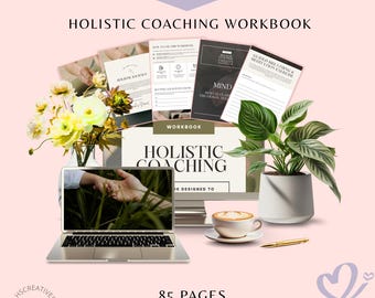 May include: A laptop, workbook, and plant are arranged on a pink surface. The workbook is titled "Holistic Coaching Workbook" and includes the text "85 Pages." A cup of coffee and a pen are also present.