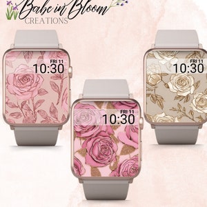 May include: Three different watch faces with rose designs. The first watch face has a pink rose design with gold accents. The second watch face has a beige rose design with gold accents. The third watch face has a pink rose design with gold glitter accents. All watch faces display the time as 10:30 and the date as FRI 11.