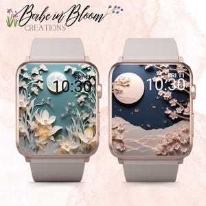Pode incluir: Dois mostradores de Apple Watch com uma banda cinza claro e uma caixa de ouro rosa. Os mostradores do relógio apresentam um design de recorte de papel de uma lua, flores e um céu noturno. A hora é exibida como 10:30 em ambos os mostradores.