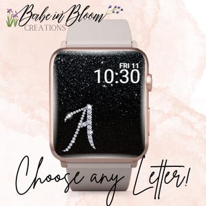 May include: Rose gold smartwatch with a black glitter background showing the time and date. A sparkling letter "A" is displayed. The text "Choose any Letter!" is written in a cursive font.