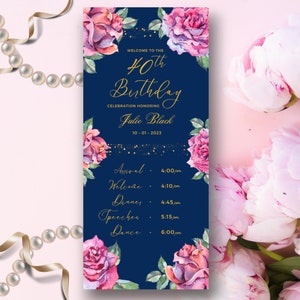 May include: A navy blue invitation card for a 40th birthday celebration. The card features gold script text and watercolor roses in shades of pink and red. The invitation includes the name Julie Black and the date 10-01-2023, along with the event schedule.