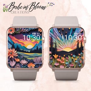 May include: Two rose gold Apple Watch faces with a colorful paper art design featuring a sunset landscape with mountains, trees, and flowers. The time is displayed as 10:30 on both faces.