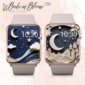 Puede incluir: Dos esferas de reloj Apple de oro rosa con una banda blanca. Las esferas del reloj presentan un diseño de estilo de corte de papel con una luna creciente, estrellas y nubes. La hora se muestra como 10:30. El texto "FRI 11" se muestra en la esfera del reloj.