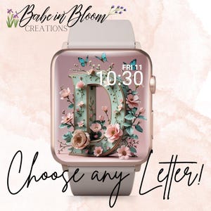 May include: A rose gold smartwatch shows the letter "D" decorated with pink flowers and blue butterflies. The watch face displays the time as 10:30 and the date as Friday, the 11th. The text "Choose any Letter!" is written in cursive.
