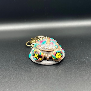 Sombrero Isha de Arcane, llavero hecho a mano