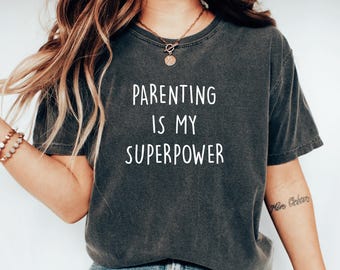 Kindererziehung ist meine Superkraft Lustiges Eltern-Shir-Geschenk für Eltern Lustiger Papa Shirt Mama-Leben-T-Stück Elternschaft Humor Muttertagsgeschenk für Mama Geburtstag