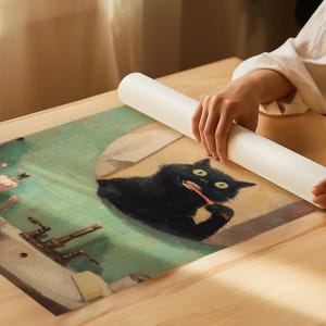 K&ouml;nnte beinhalten: Gerollter Druck eines schwarzen Katers, der sich die Z&auml;hne putzt, mit gr&uuml;nem und beigem Hintergrund. Die Katze hat gelbe Augen und eine rote Zahnb&uuml;rste. Der Druck wird auf einer Holzoberfl&auml;che ausgerollt.