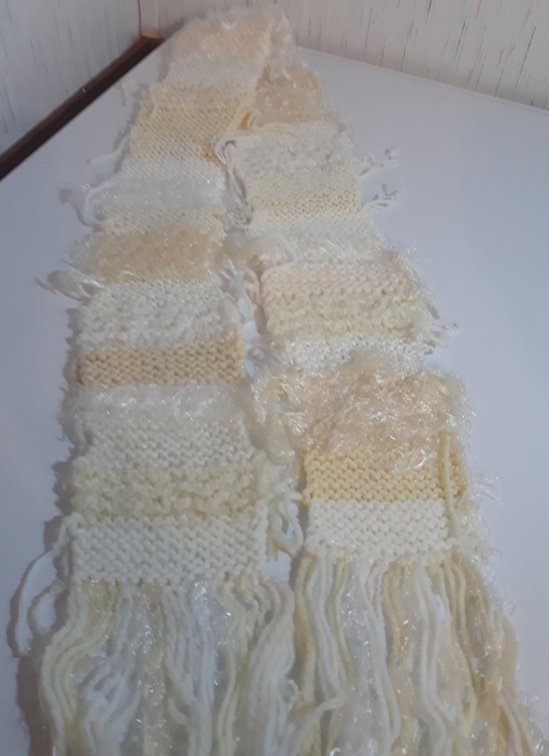 Scarf Made With Many Cream and White Colored Yarns With Fringe