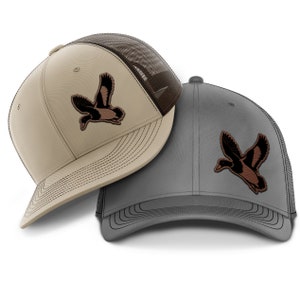 Duck Hunting Hat (left), Leather Patch Hat, Waterfowl Hunting Hat, die-cut leather patch trucker hat for duck hunters.