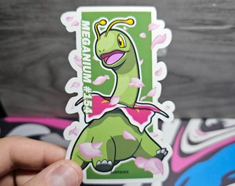 May include: A green and pink Pokemon sticker featuring Meganium #154. The Pokemon is standing on a green background with pink flower petals around it. The sticker has a white border.