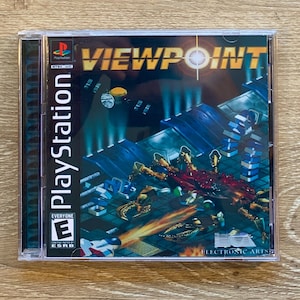 May include: A PlayStation game case with a blue and black background. The game title is "VIEWPOINT" in yellow letters. The game is rated "E" for Everyone by the ESRB. The game is published by Electronic Arts.