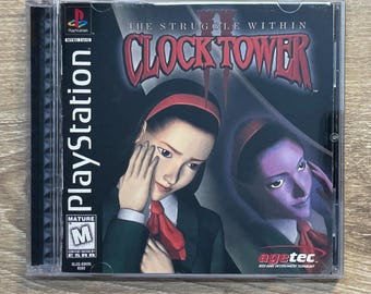 May include: A PlayStation game case for "Clock Tower II: The Struggle Within." The cover art features two women with red headbands and ties, with the game title in a red, gothic font. The case is in a clear plastic jewel case.