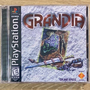 Grandia Sur Playstation 1 (PS1) - Version PAL Complète (boîte, Livret, CD) - Très Bon état