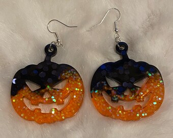 Jack o’ lantern earrings (black and orange glitter)