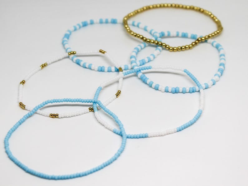 Eye-Catching Stack of Beaded Bracelets in UNC Tar Heels Colors - UNC Tar Heels Jewelry