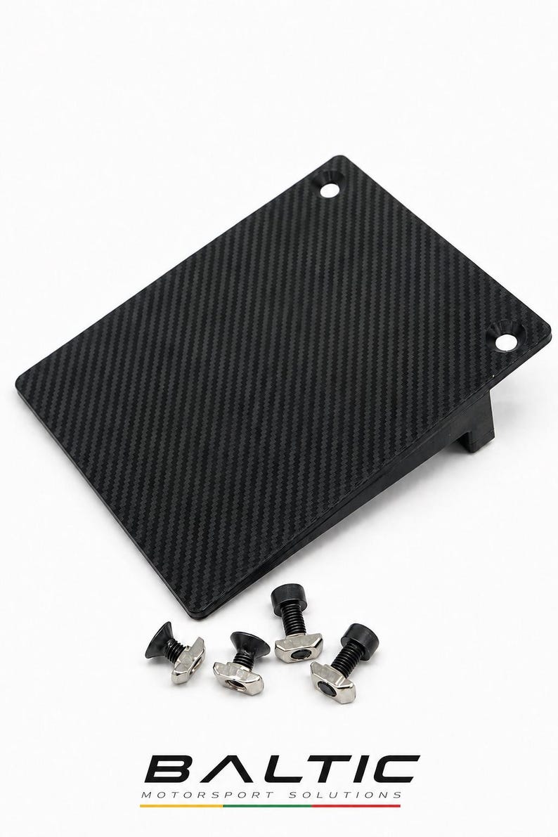 May include: A rectangular black carbon fiber plate with a visible weave pattern and two circular mounting holes at the top edge. The plate is accompanied by four small metal T-slot bolts with black heads. The text BALTIC MOTORSPORT SOLUTIONS is below.