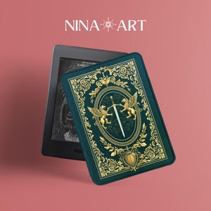 May include: A teal Kindle cover with gold filigree and a central design featuring a sword and two winged creatures. The cover is paired with a black Kindle e-reader. The text "NINA-ART" is at the top.