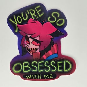 May include: A sticker featuring a cartoon character with pink hair, red eyes, and sharp teeth. The sticker has the text "YOU'RE SO OBSESSED WITH ME" in green and white lettering. The background is a gradient of purple and blue.