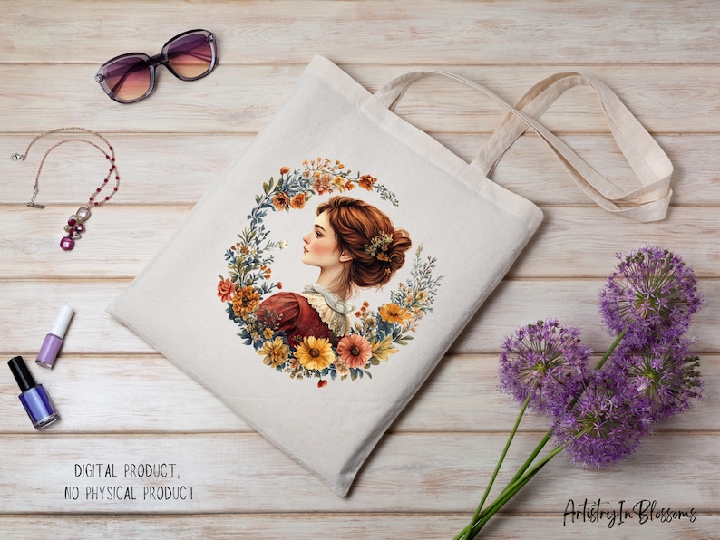 May include: A white tote bag with a floral design featuring a woman with brown hair and a wreath of flowers. The bag has a long strap and is made of canvas.