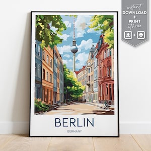 May include: A colourful illustration of a street scene in Berlin, Germany. The street is lined with buildings and trees, and the iconic Fernsehturm tower is visible in the background. The text "BERLIN" and "GERMANY" is printed below the image.