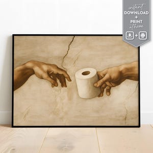 Könnte beinhalten: Ein gerahmter Druck, der eine humorvolle Interpretation von Michelangelos 'Die Erschaffung Adams' darstellt. Das Kunstwerk zeigt zwei Hände, die sich berühren, wobei eine Hand eine Rolle Toilettenpapier anbietet. Der Hintergrund ist eine sepiafarbene Wand.