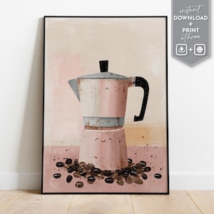 May include: A framed art print featuring a whimsical illustration of a pink and gray stovetop espresso maker with a smiling face. The artwork includes coffee beans at the base and the words "instant download + print at home".