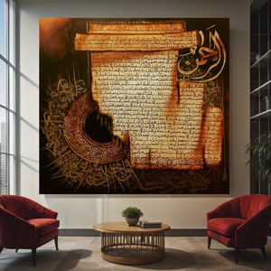 May include: Large framed artwork featuring Arabic calligraphy in gold and brown tones. The artwork depicts intricate script on a parchment-like background, with a circular design on the left. The piece is displayed in a modern living room setting with red chairs.