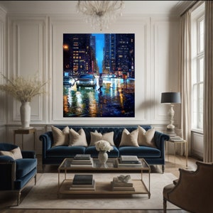 May include: A painting of a city street at night with cars and people walking in the rain. The buildings are tall and lit up with lights. The street is wet and reflecting the lights. The painting is in a modern living room with a blue sofa and a coffee table.