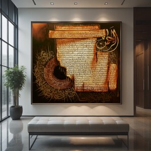 May include: A large framed artwork with gold Arabic calligraphy on a textured, aged paper background. The artwork features detailed script and a crescent moon design, creating a rich, cultural aesthetic. The piece is displayed in a modern interior setting.