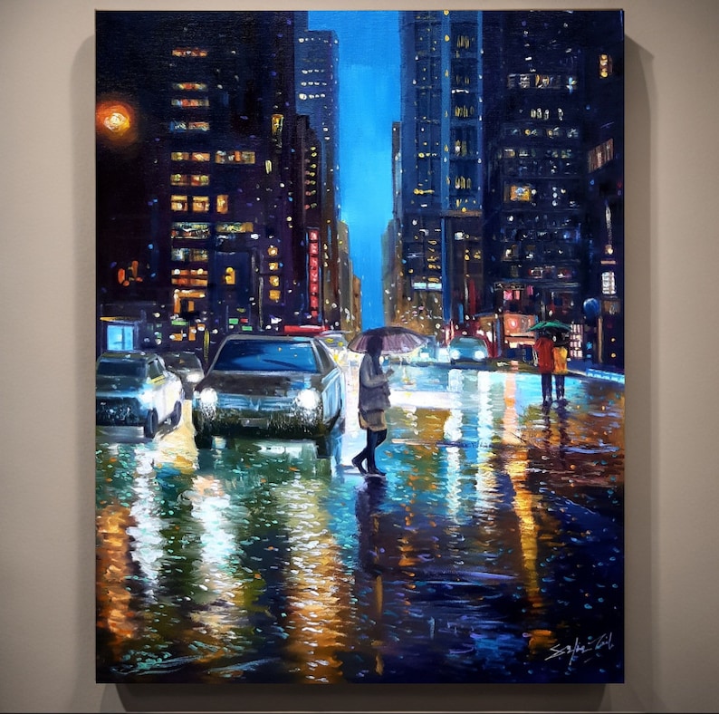 May include: A painting of a city street at night with cars and people walking under umbrellas in the rain. The street is wet and reflecting the lights of the buildings. The buildings are tall and dark, with windows lit up.