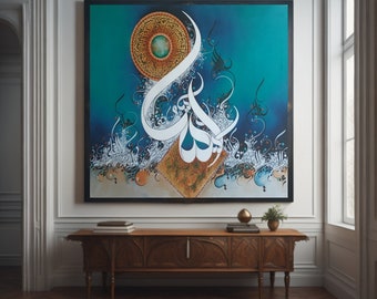 May include: Large square artwork featuring white Arabic calligraphy on a teal background. The painting includes a circular design with gold and brown accents, and a geometric pattern. The artwork is framed in black and hangs above a wooden cabinet.