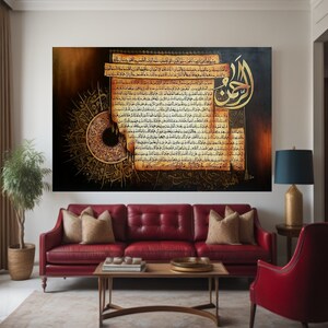 May include: Large framed artwork with gold and brown Arabic calligraphy. The artwork has a dark background with a circular design and text resembling aged parchment. It is displayed above a red leather sofa in a living room.