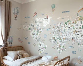May include: A child's bedroom featuring a world map wall decal with illustrations of animals, boats, and hot air balloons. The map is on a light gray wall above a bed with a rattan frame and beige bedding. The room has a cozy, playful atmosphere.